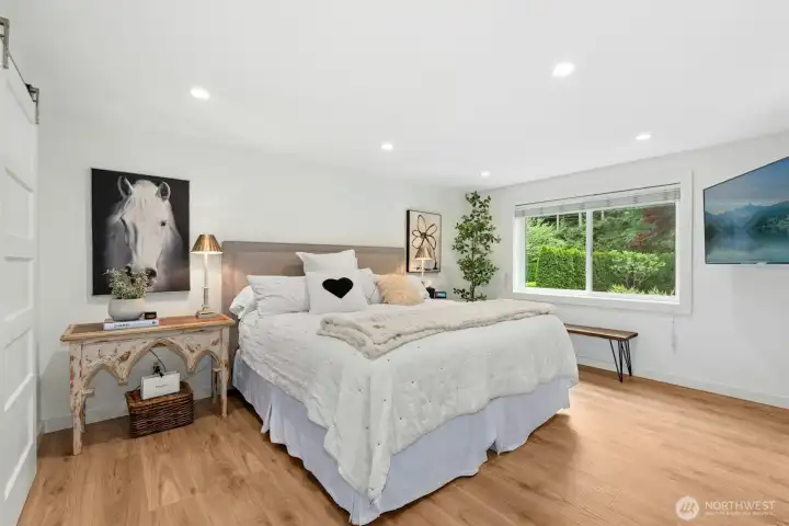 Primary suite complete with walk-in closet and luxurious 5-piece bathroom