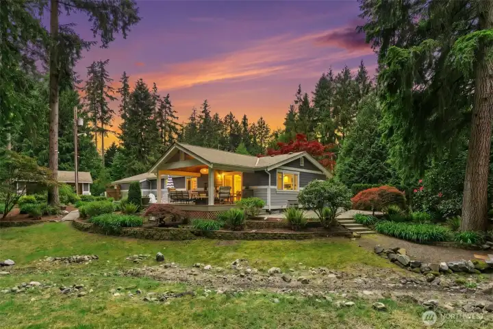 Tranquil backyard perfect for gatherings, gardening, or quiet relaxation