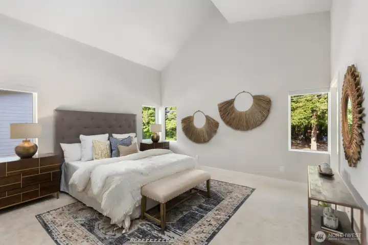 Primary suite, 5 piece bath with vaulted ceilings.