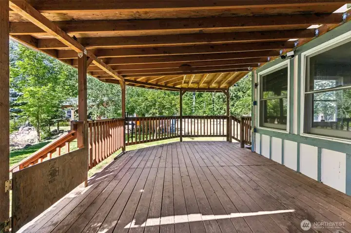 Large deck overlooking pond and backyard Large deck overlooking pond and backyard