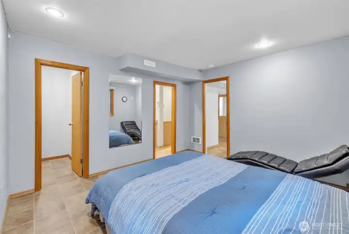 MIL suite bedroom w/ WIC & 3/4 bath.