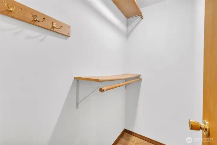 Walk-in closet serves MIL suite.