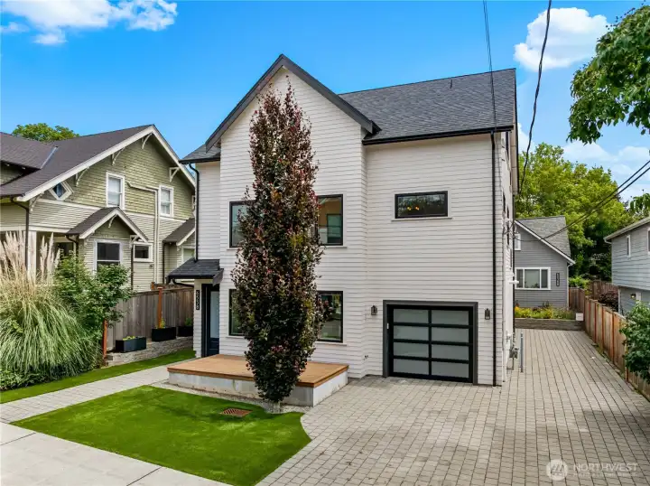 Spacious, shared driveway shows beautiful young 5-bedroom home in front and the original, fully-renovated 2nd, detached, 2-bedroom/1 bath condominium home in back, which is also available. Spacious, shared driveway shows beautiful young 5-bedroom home in front and the original, fully-renovated 2nd, detached, 2-bedroom/1 bath condominium home in back, which is also available.