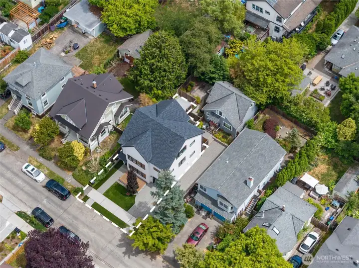 Dotted lines show approximate outline of main home's lot that includes fenced yard space and patio in back. Dotted lines show approximate outline of main home's lot that includes fenced yard space and patio in back.