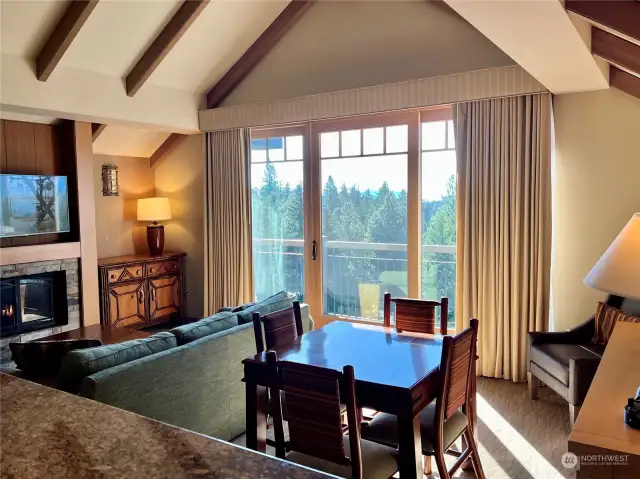 Living room with vaulted ceilings.