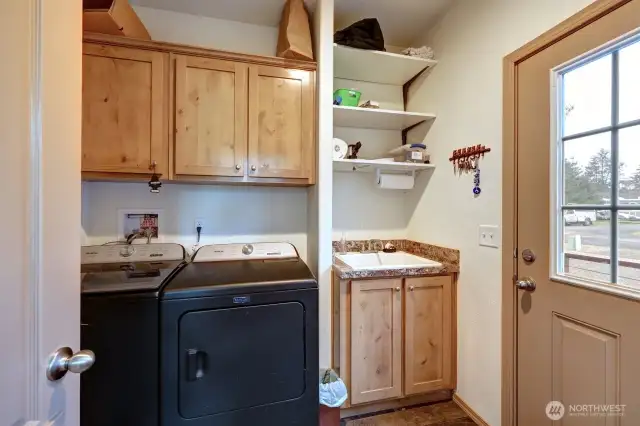 Laundry/Utility room just off the back door to the driveway and garage.