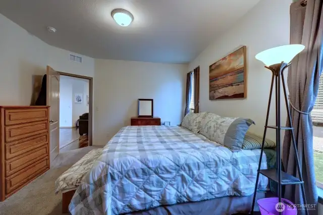 Primary bedroom with full bath and walk in closet.