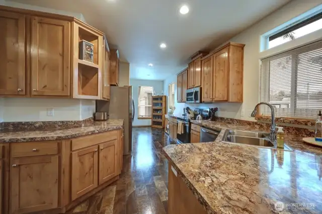 From the dining room looking through the kitchen to the breakfast nook.