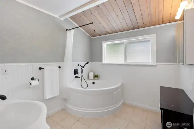 Unwind in comfort. After a paddle around the lake or a hike through nearby trails, return to a hot soak under the charm of a wood-paneled ceiling.