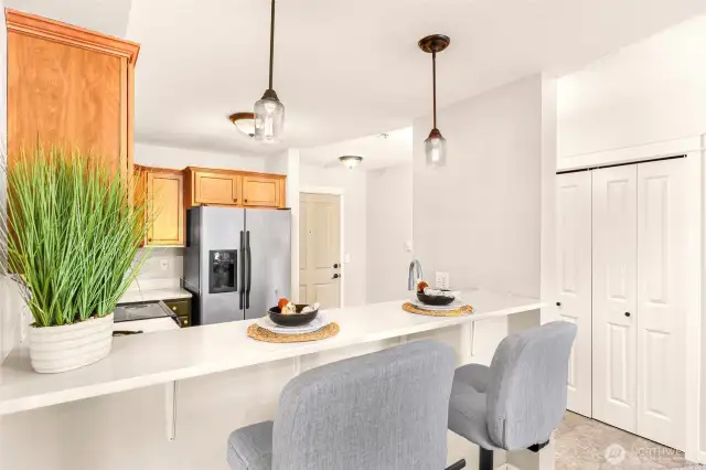 Eat in bar space with wide new quartz counters