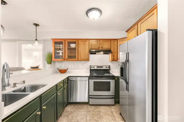 Recently updated kitchen with brand new dishwasher and quartz countertops.