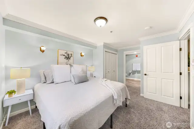 sconces and overhead light provide various lighting options. Two closets provide lots of storage.