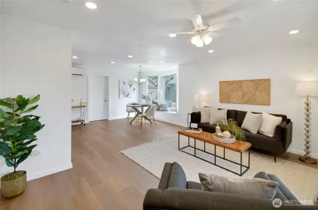 The beautiful luxury vinyl plank wood floors and freshly remodeled interior creates a soothing neutral palette.