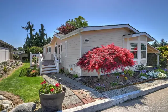 Sidewalk leads to the Front Porch & Door creating a very inviting Entry!