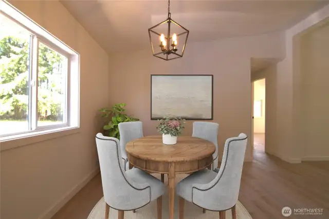 Dining area off of kitchen *virtually staged*