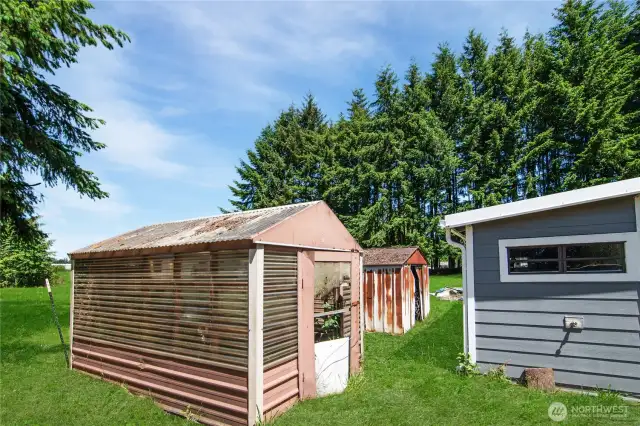 Garden shed or greenhouse, small work room on side of carport