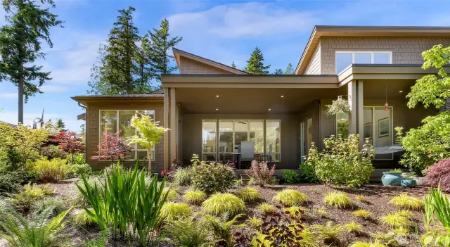 Modern design and plenty of windows let the beauty of this location shine