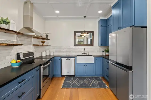 The remodeled kitchen marries modern conveniences with classic style, preserving the home’s character while offering up-to-date amenities.