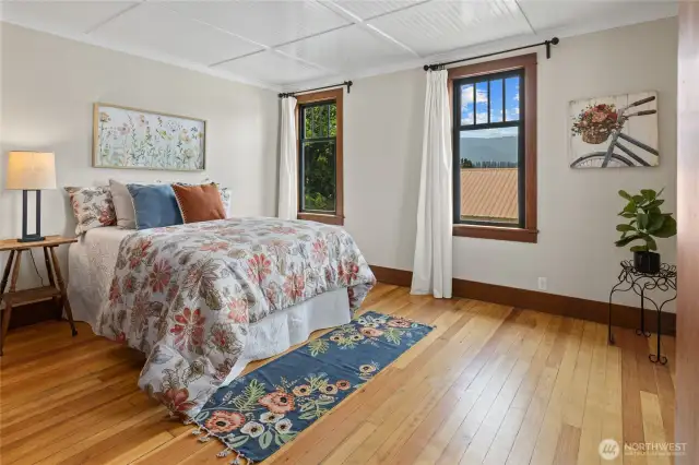 Beadboard ceilings and new windows throughout the upper level.