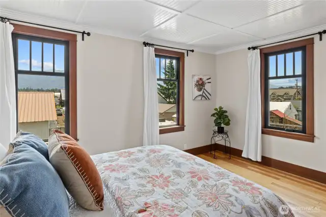 Views of Peoh Point can be enjoyed from the primary bedroom.