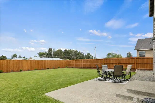 Landscaped & fully fenced backyard complete with underground sprinklers