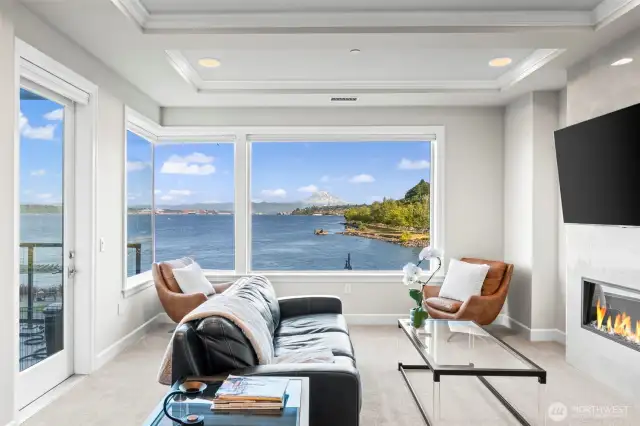 Cozy up by the electric fireplace and take in your expansive everyday picturesque view!