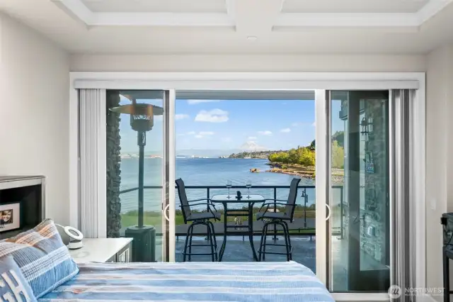 Wake up and go out to your covered patio from your primary suite.