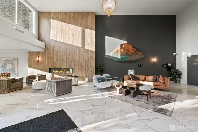 Upon entry of the Rainier building you are greeted to a grand lobby with seating to chat with guests or neighbors