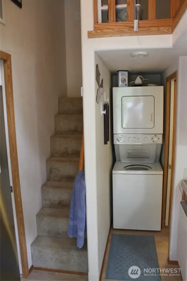 This is as you enter. The stairs lead to the sleeping loft. The Stacker washer/dryer stay.