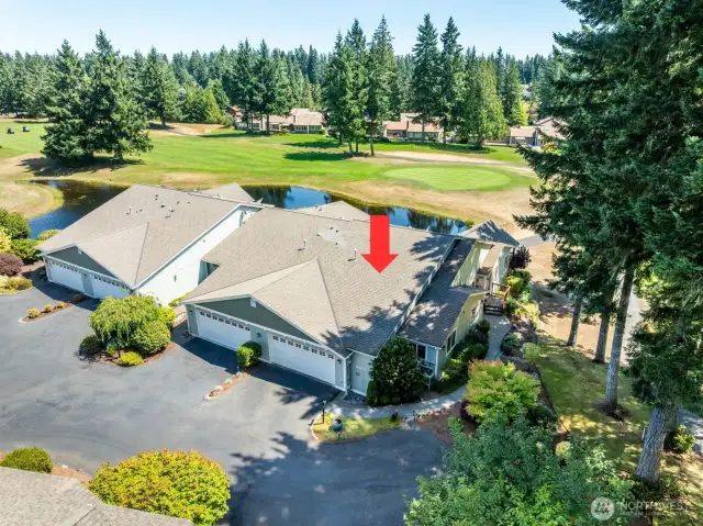 Rare find! A one-level end unit, pristine condo on the golf course.