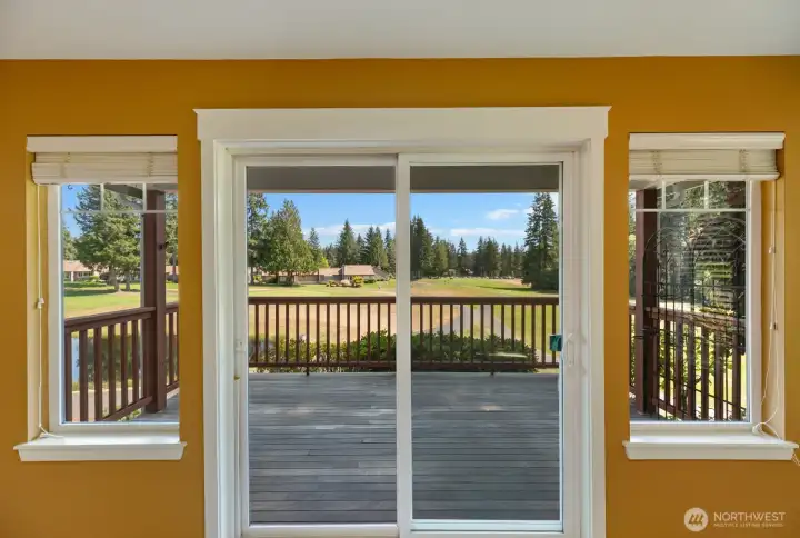 Sliding glass doors lead to the view deck off the living area.
