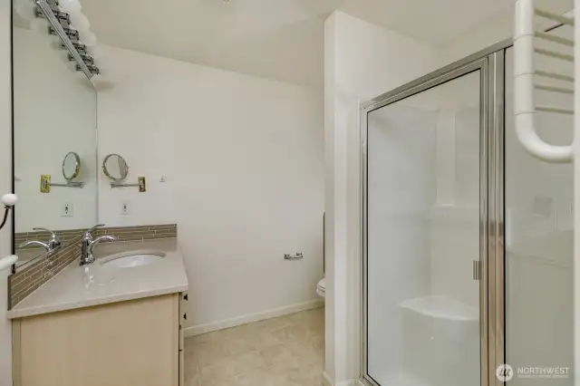 Here's a full guest bath with a large walk-in shower.