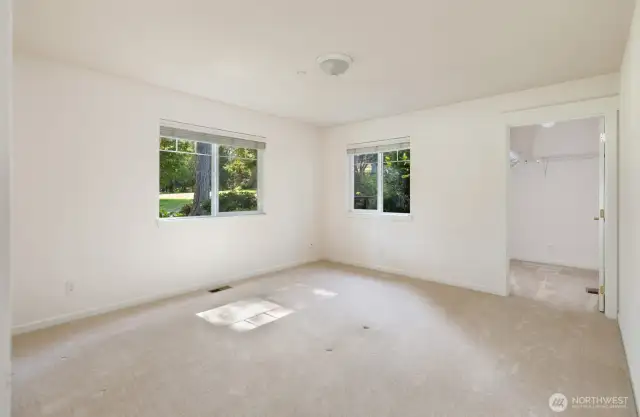 The guest bedroom includes a massive walk-in closet.