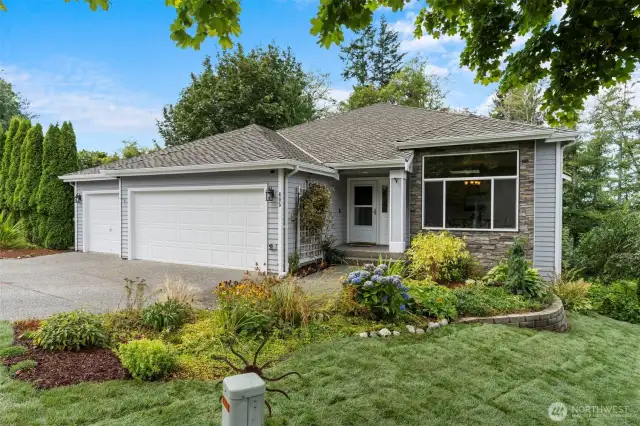 A welcoming front entrance and porch, offering a warm first impression for anyone visiting this beautiful cul-de-sac home.