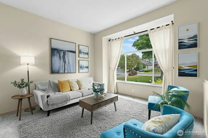 Elegant twilight shot featuring warm exterior glow and evening sky views.(Virtually Staged)