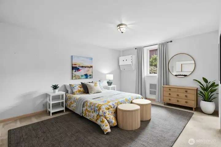 Private second primary suite with 3/4 bath and walk-in closet—ideal for guests or in-laws. ( Virtually Staged )