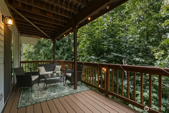 Your outdoor sanctuary. The patio is the perfect spot for morning coffee or evening stargazing, all while enjoying the peaceful greenbelt view.