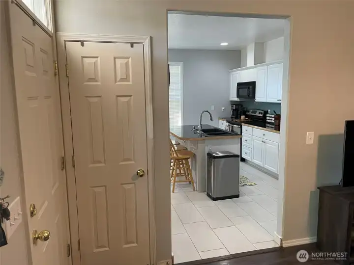 Kitchen entry to left of living room.