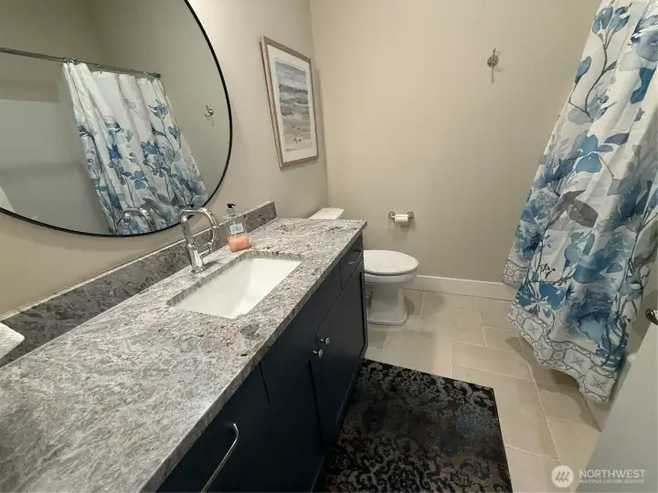 Full bath just off mud room