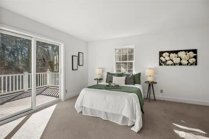 his spacious primary bedroom is fitted for those who love a bit of fresh air.