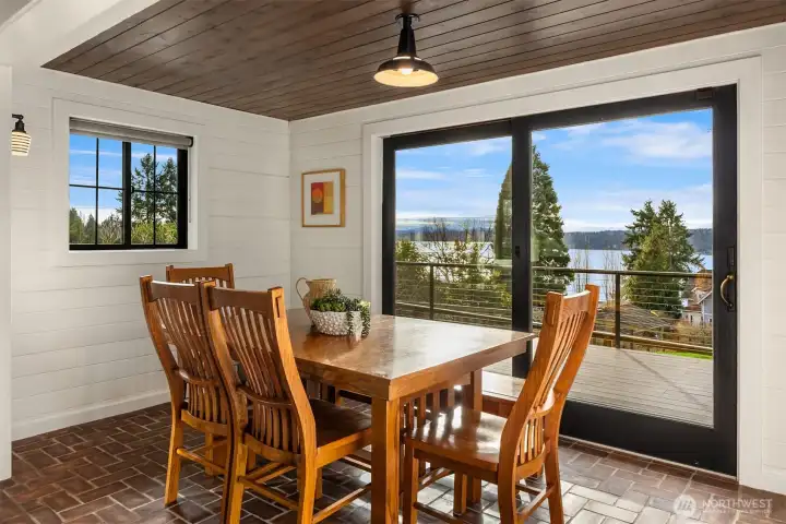 The dining room has a south-facing window and large sliding glass door that leads to over 600 square feet of deck space.
