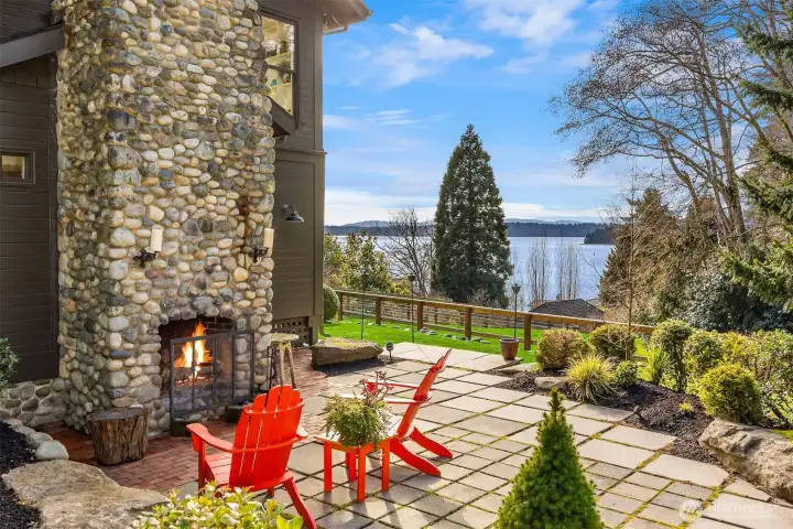 Enjoy sunset views while you bask in the warmth of the wood-burning outdoor fireplace.