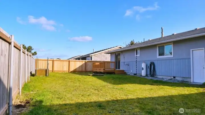 Fully usable grass yard offering excellent depth and privacy, ideal for recreation, pets, or gardening.