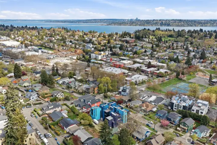 Lake Washington in the background. Excellent transit options in this Seattle-Columbia City location, just 4 blocks from the Link Light Rail station.