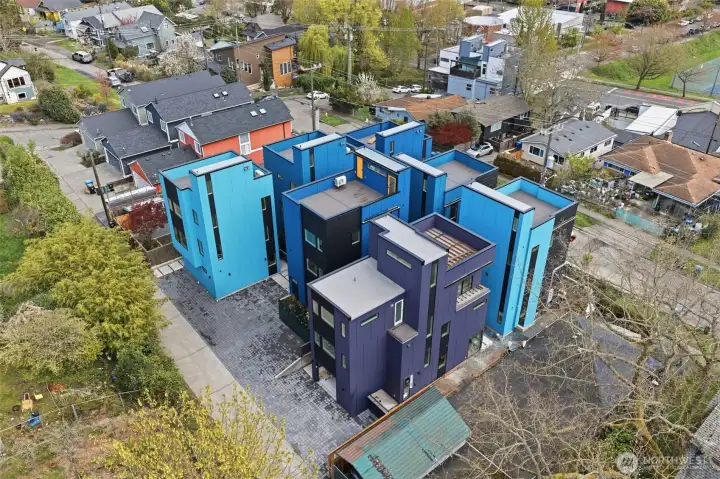 Home C is on the upper left with alley access and a deeded parking space adjacent to the home.