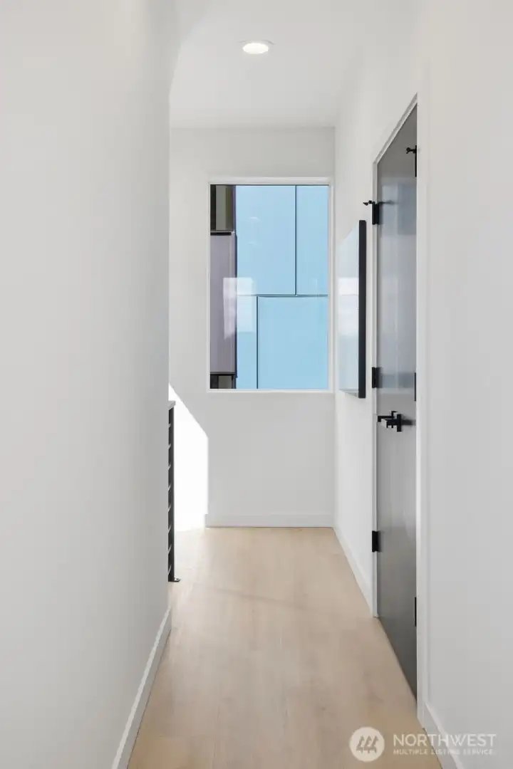 The utility area has its own space with extra storage.