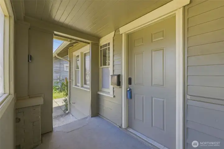 Cute covered porch welcomes you!