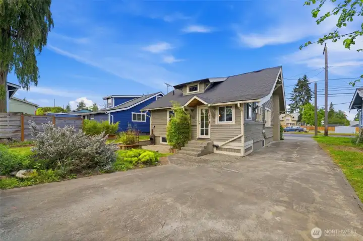 Back yard has tons of paved area for your storage needs