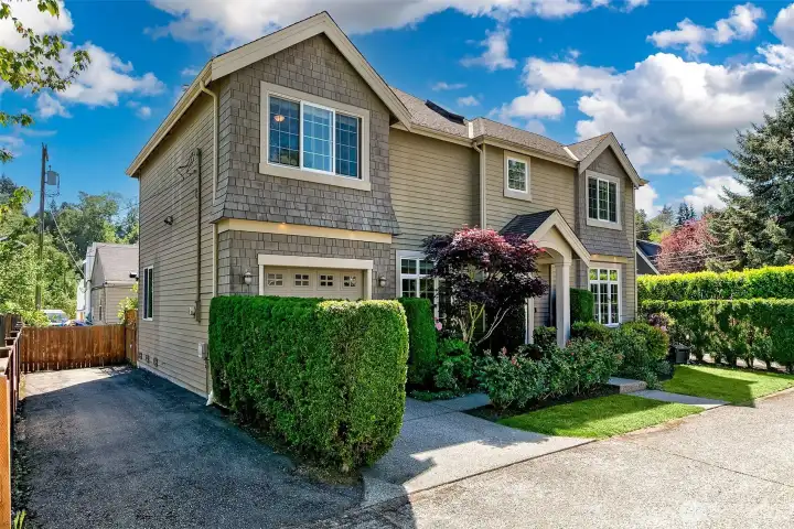 In addition to the garage and driveway you will find an additional parking pad on the north side of the house.