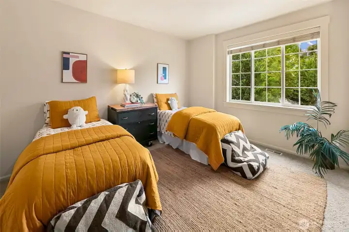 One of two bedrooms on the second floor.